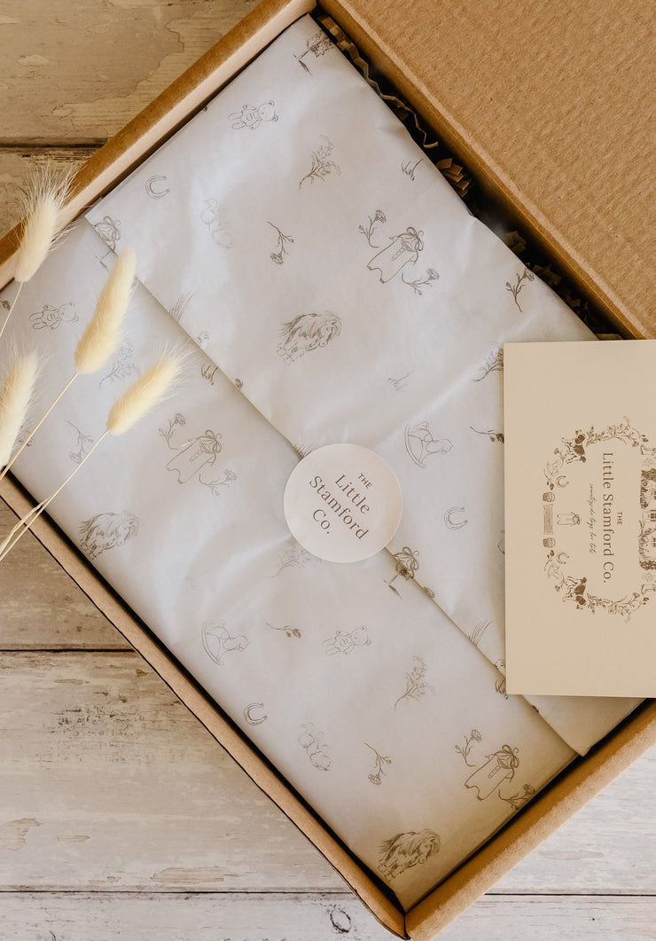 Sheep Lamb organic cotton cot bed sheet for baby and toddler displayed in cot by The Little Stamford Co