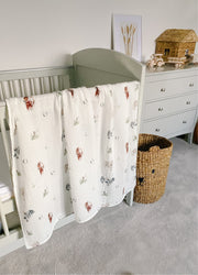 Pony print muslin swaddle blanket